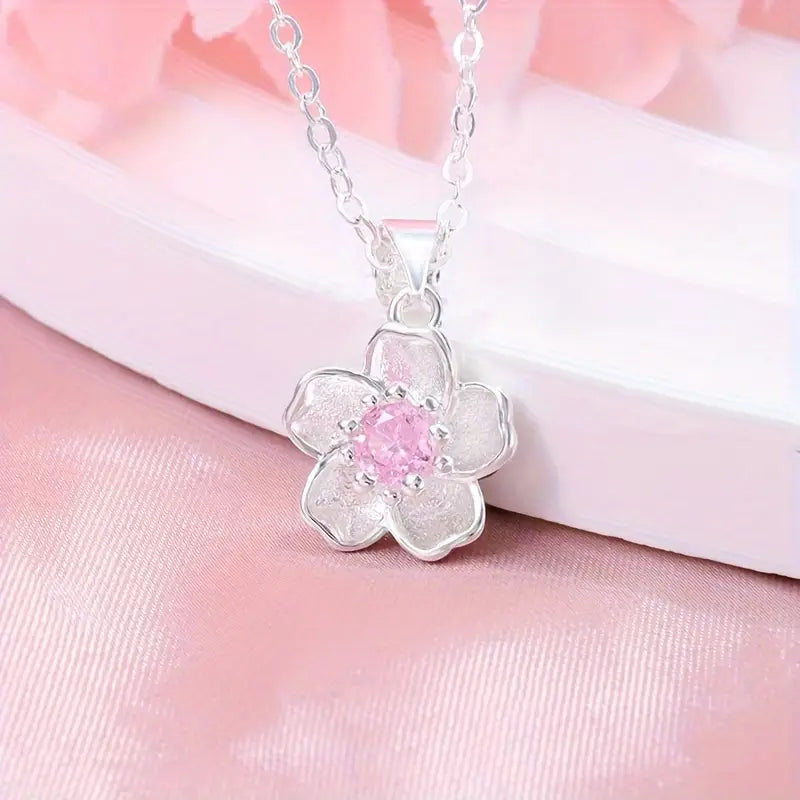 COLLAR CON DIJE DE FLOR DE CEREZO Y PIEDRA NATURAL