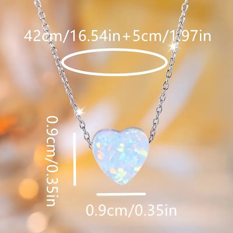 COLLAR CON DIJE EN CORAZÒN DE ÒPALO Y PLATA