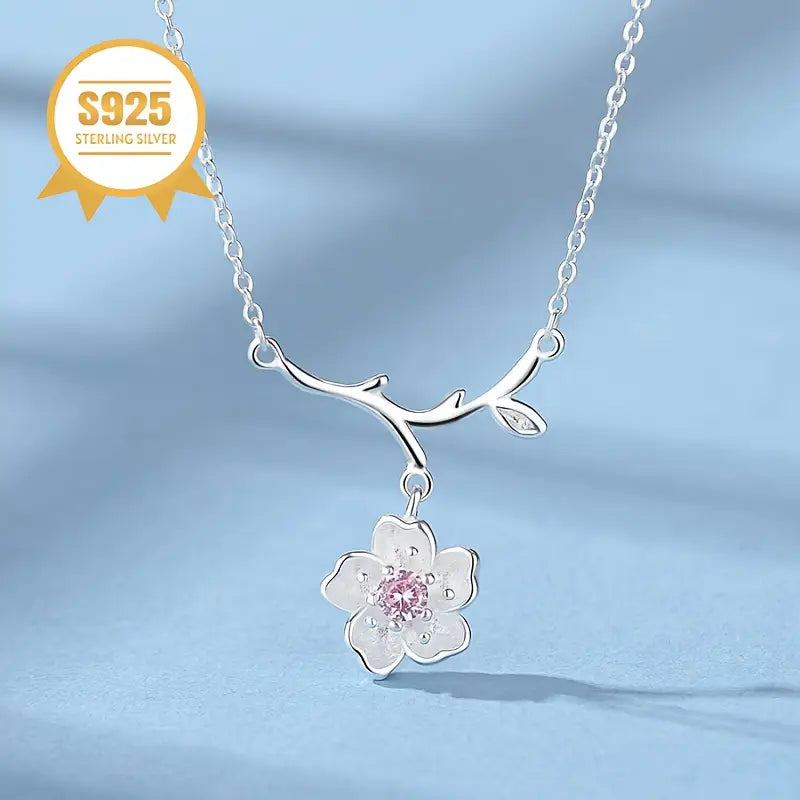 COLLAR CON DIJE DE FLOR DE CEREZO Y PIEDRA NATURAL