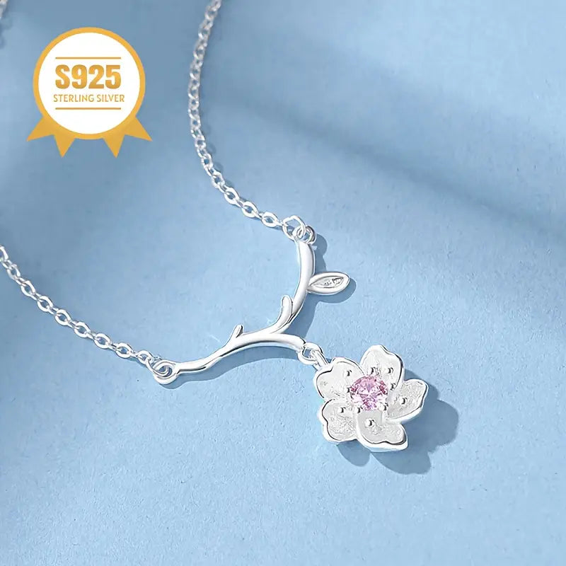 COLLAR CON DIJE DE FLOR DE CEREZO Y PIEDRA NATURAL