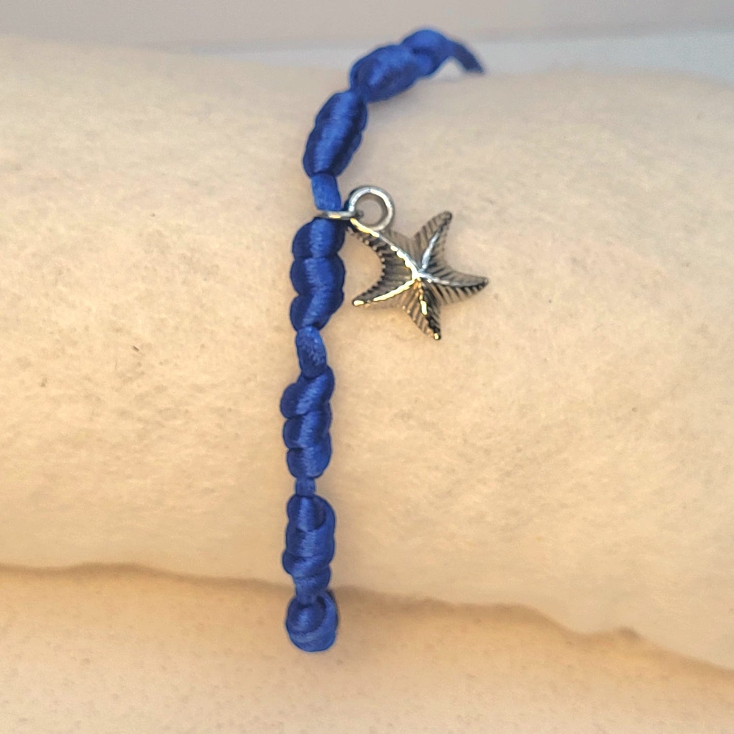 PULSERA AZUL 7 NUDOS CON ESTRELLA DE MAR