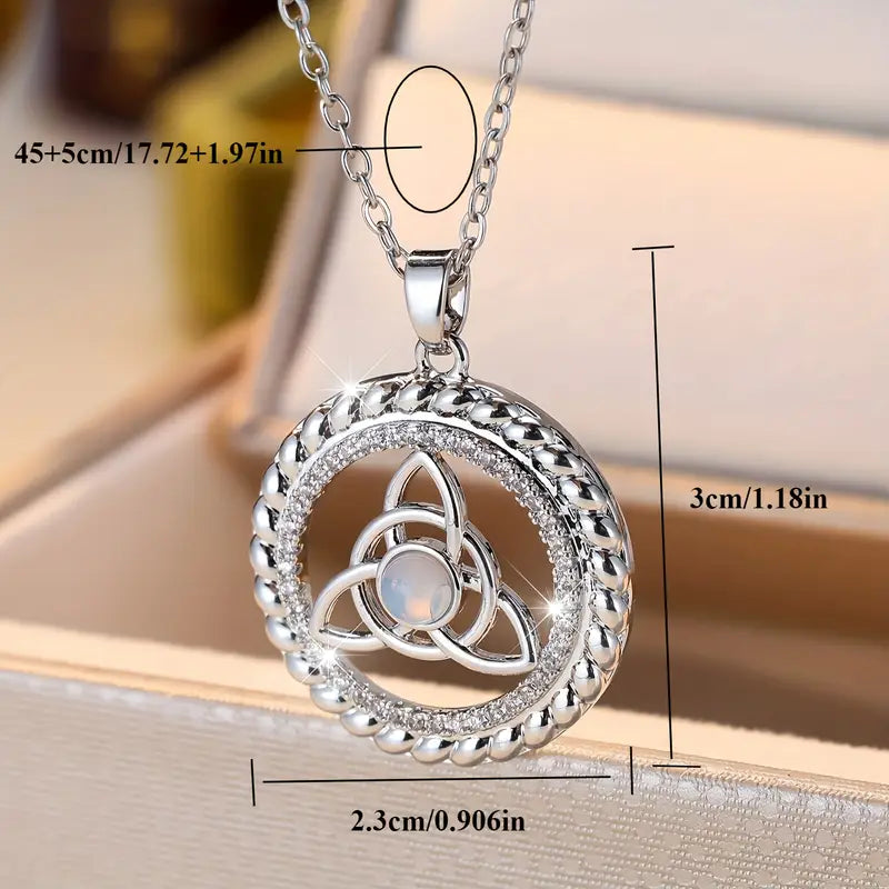 COLLAR CON DIJE DE NUDO DE BRUJA EN PLATA Y PIEDRA LUNA