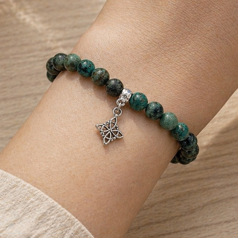 Pulsera de turquesa africana con nudo de brujas y plata (6 mm)