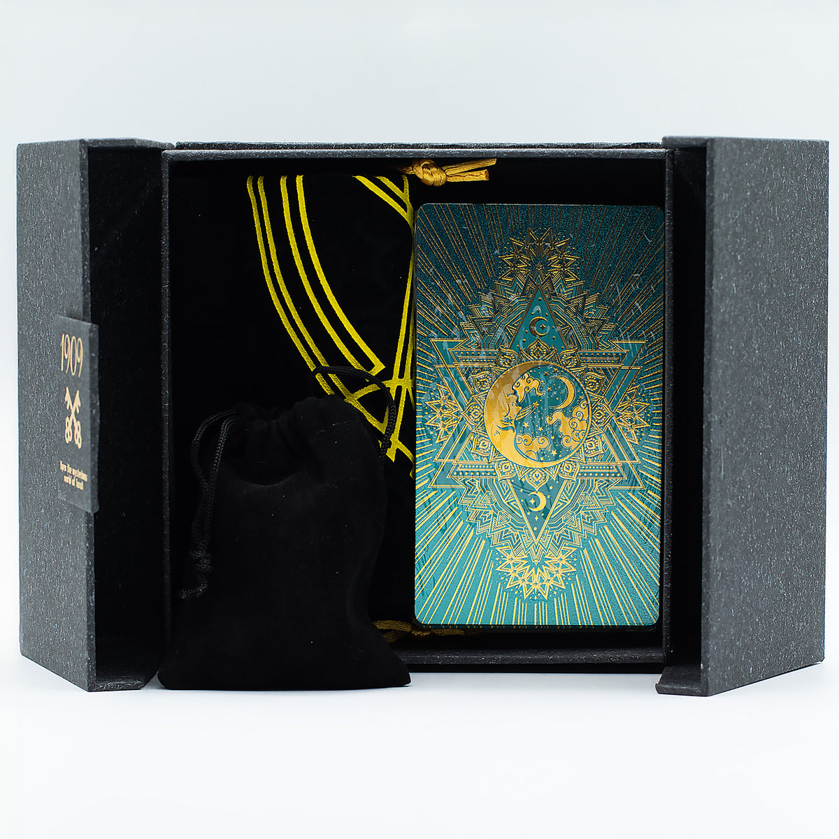Cartas de tarot doradas y turquesas con guía y piedras