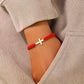 PULSERA CON CRUZ