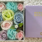 FLORES DE JABÓN  - CAJA CUADRADA BENDICIONES DE BEBÉ AZUL
