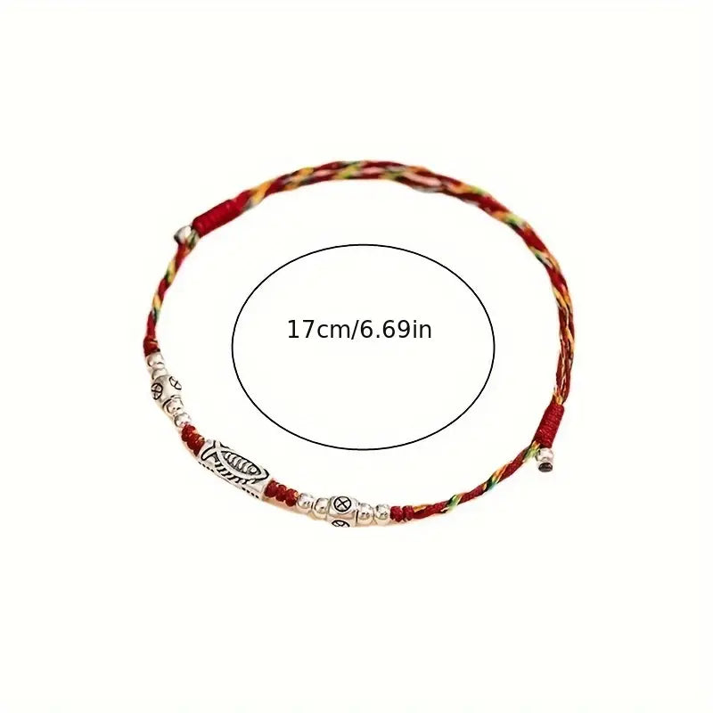 PULSERA DE HILO TRENZADA CON DIJE DE PEZ DE VIDA