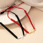 PULSERA CON CRUZ