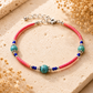 Pulsera Nepalés de Gemas Extra Finas - Cuentas de Coral Rosa y Turquesa
