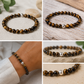 Pulsera ojo de tigre con perla de plata- Confianza y determinación