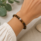 Pulsera ojo de tigre con perla de plata- Confianza y determinación