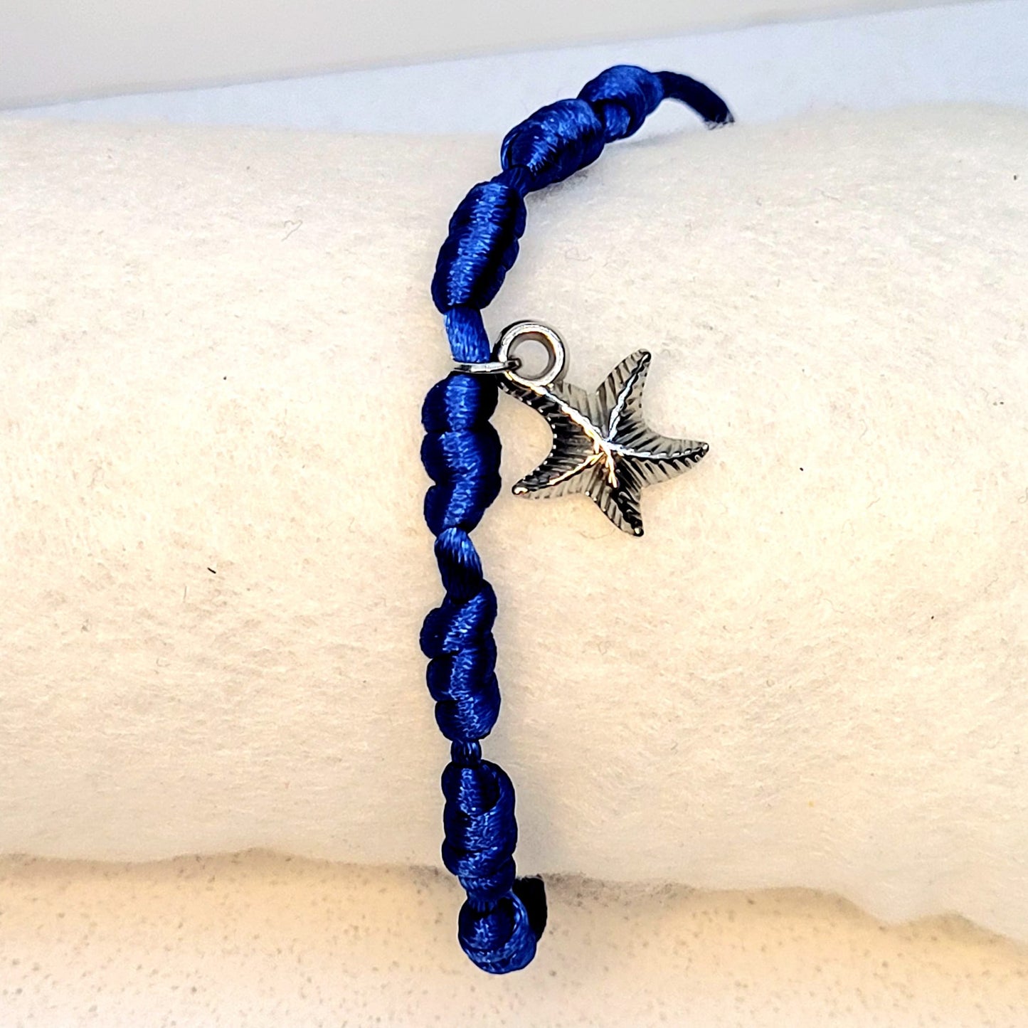 PULSERA AZUL 7 NUDOS CON ESTRELLA DE MAR