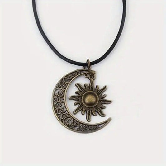 COLLAR VINTAGE DE LUNA CRECIENTE Y SOL DE BRONCE PLATEADO