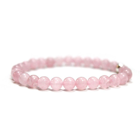 pulsera de cuarzo rosa de 6mm rodeada de una perla de plata