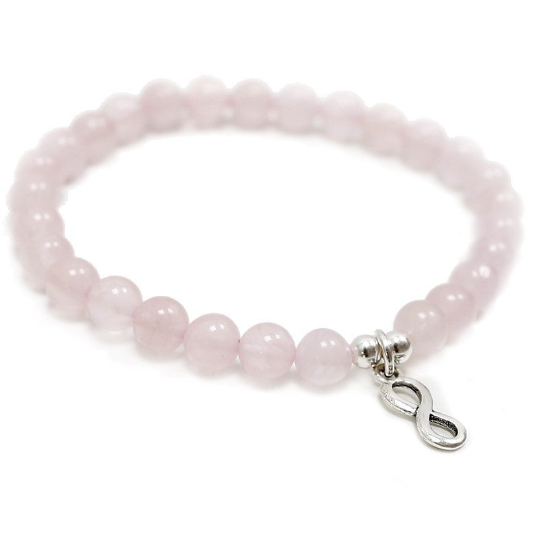 PULSERA DE CUENTAS DE CUARZO ROSA DE 6MM CON DIJES DE PLATA INFINITO